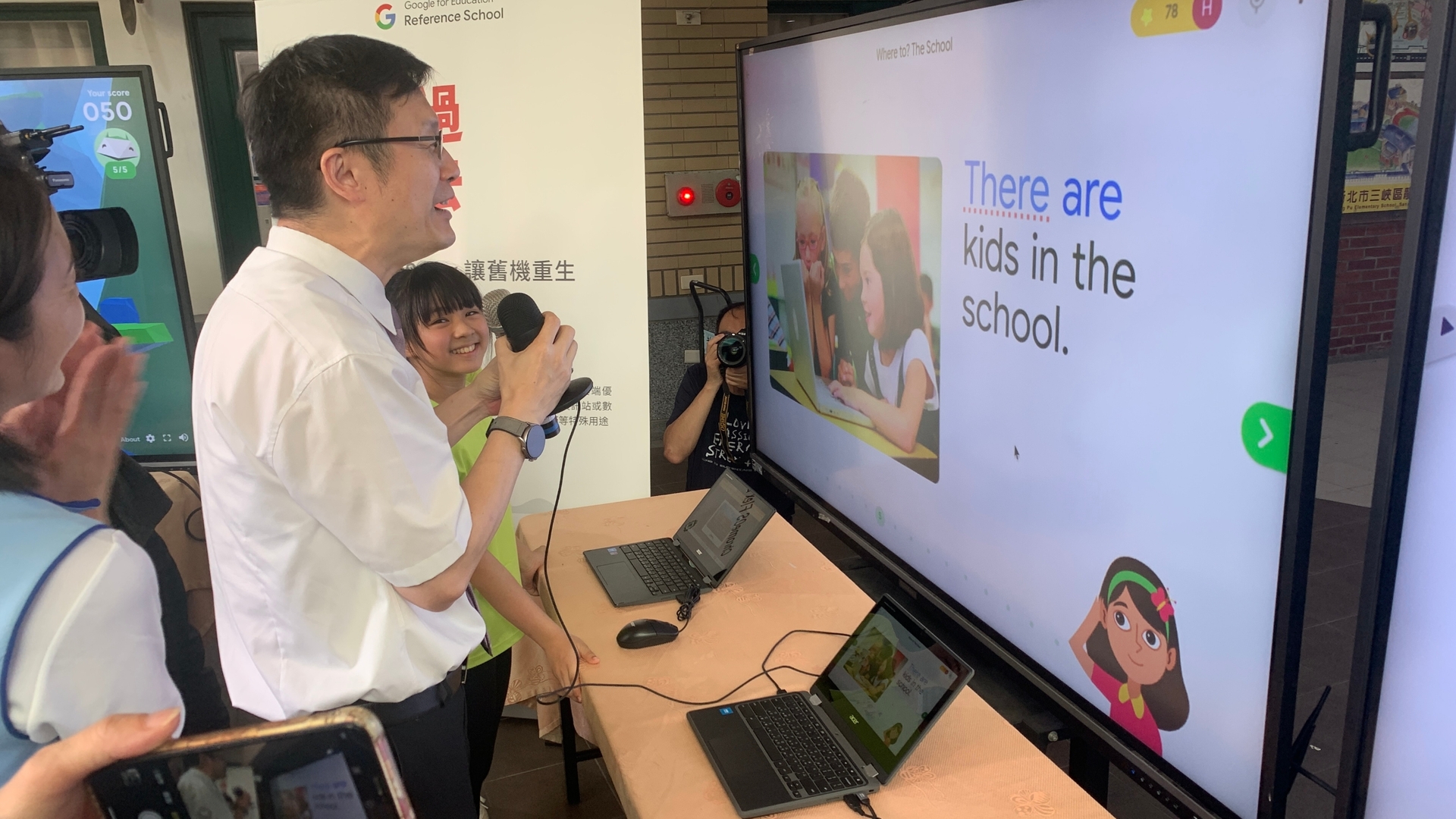 張明文局長現場運用Read along展現英語口說能力圖片